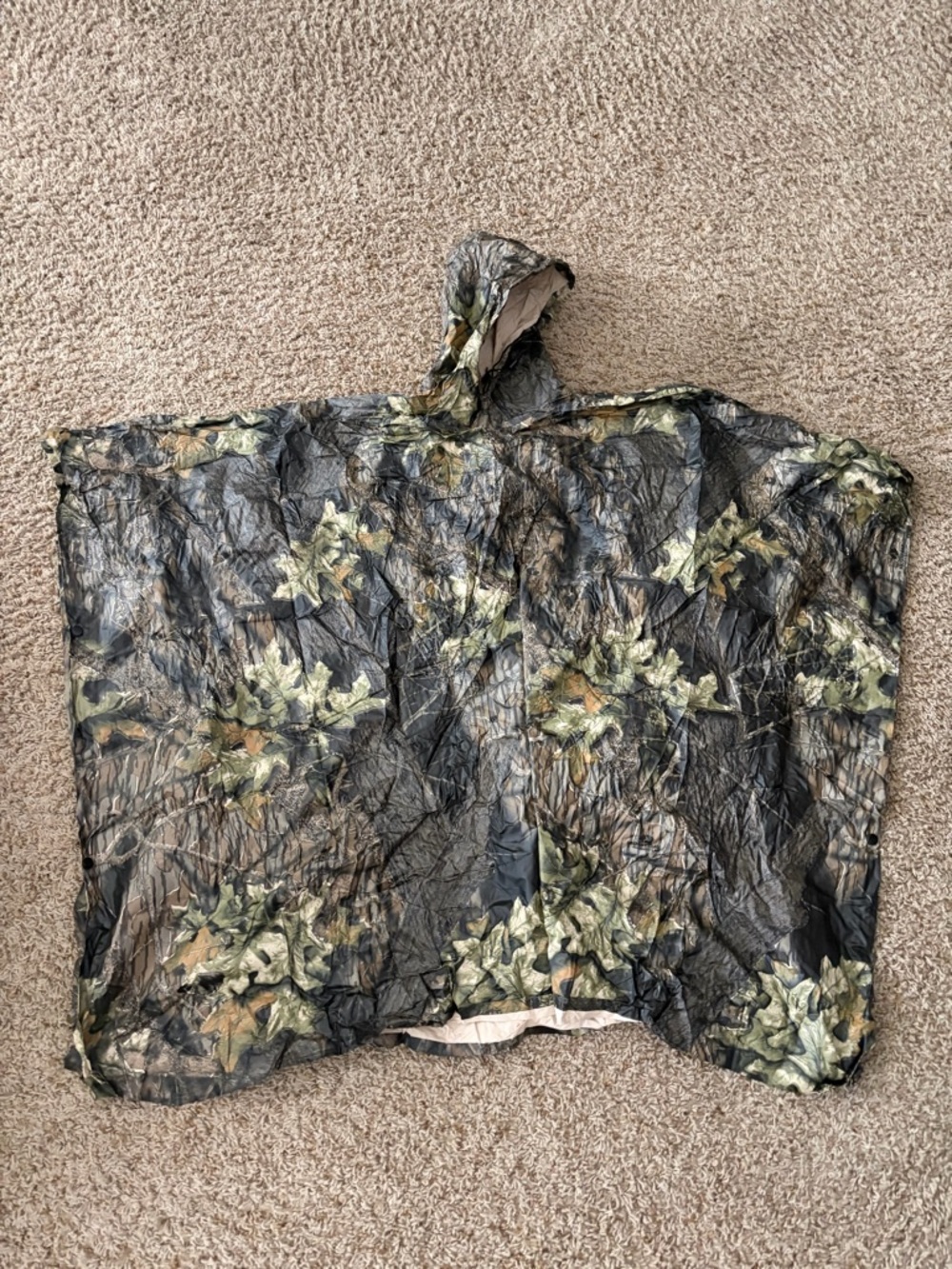 Ozark Trail Camouflage Hooded Poncho in Green and Brown, with carrying bag